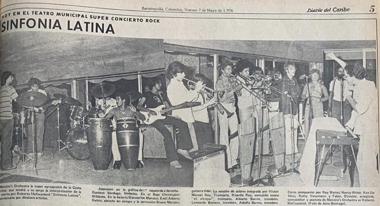 Latin Symphony performs a rock concert at the Teatro Municipal in Barranquilla, Colombia, showcasing diverse musicians and instruments.